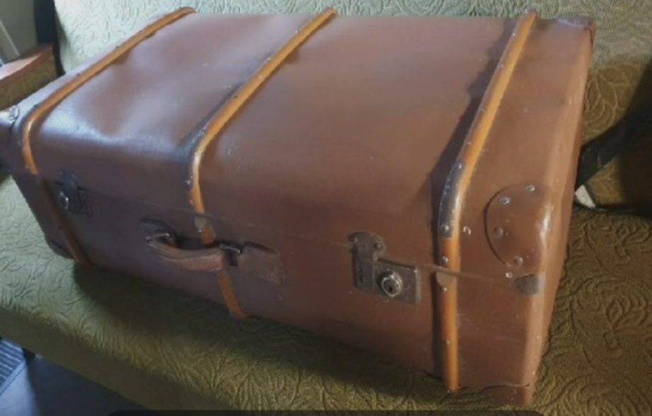 A Girl Found an Old Suitcase in the Park. She Took It Home and Opened It.